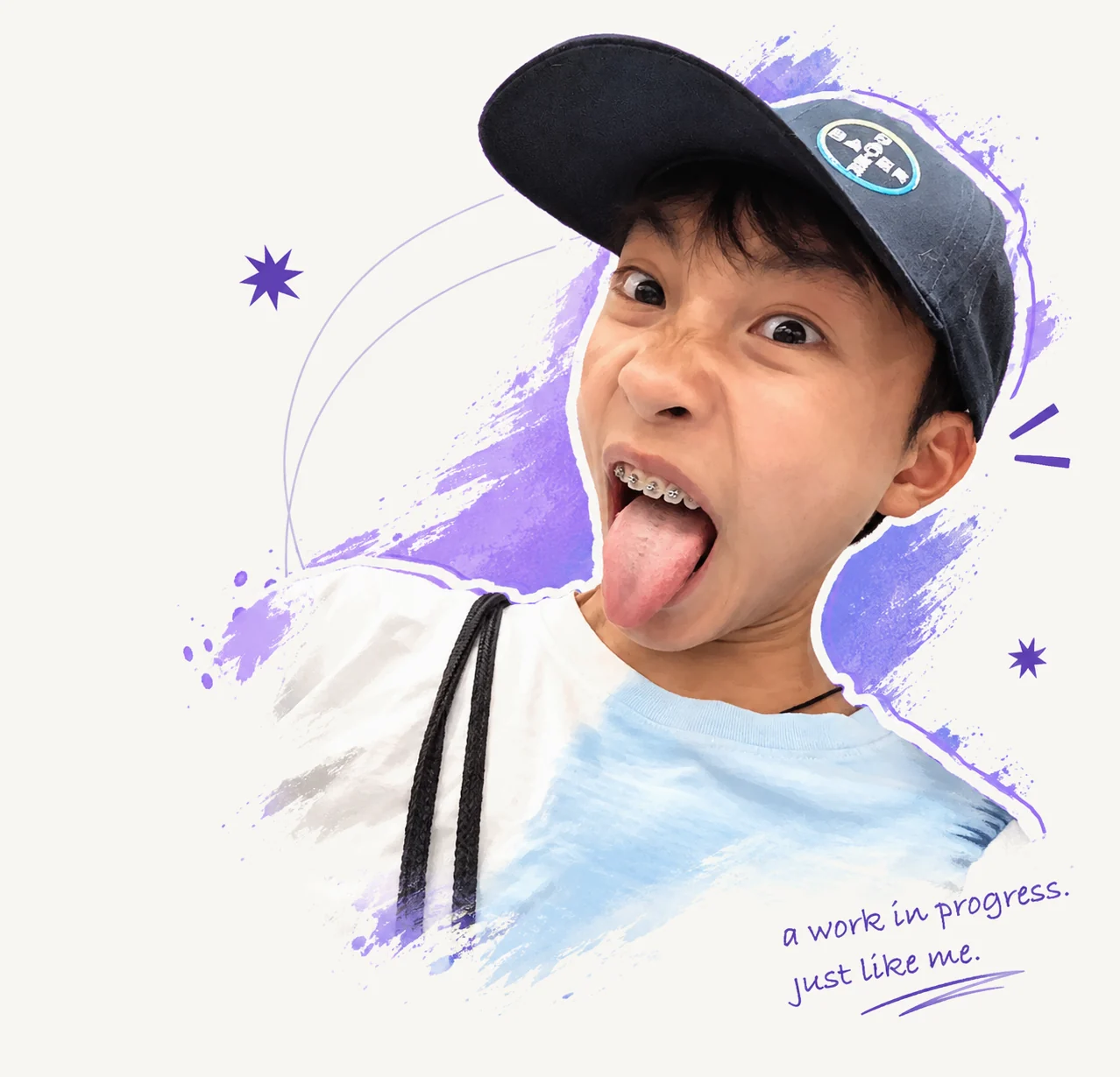 Ethan Zhou in a baseball cap, making a playful face, with purple paint strokes behind him and the handwritten note “a work in progress. just like me.”